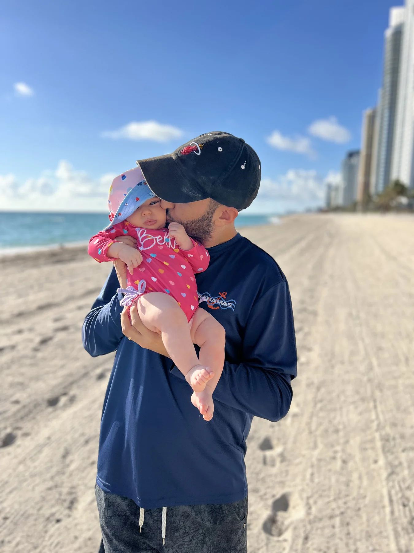 Mark Bibas holding his daughter